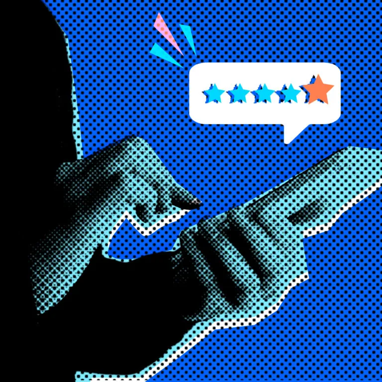 Hands holding mobile phone with review stars rating